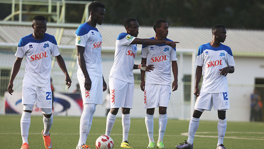 Eric Irambona (on the ball) and teammates getting ready for free-kick during the match. / Sam Ngendahimana