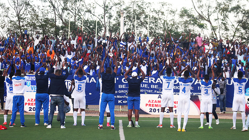 Rayon Sports players join fans for celebrations after the crucial 1-0 win over archrivals AS Kigali. / Sam Ngendahimana