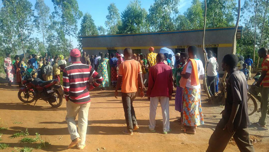 Residents of Akinteko village celebrate their newly constructed granary. Kelly Rwamapera.
