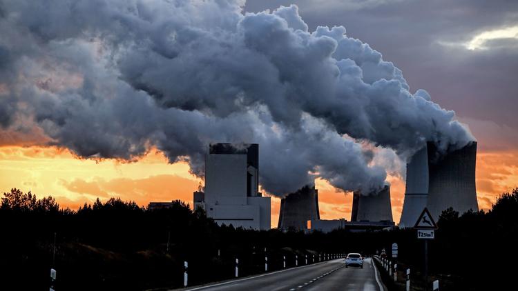 Water vapor rises from a cooling towers of the lignite-fired power station in Boxberg, Germany, on Oct. 30, 2017. File.