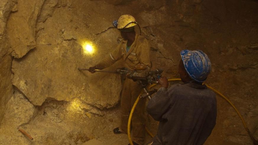 Miners in a tunnel at Gatumba Mining Centre in Ngororero District. (File)