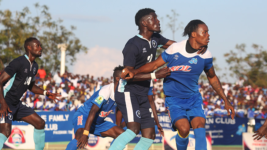 Police FC defender Hussein Habimana vies for the ball with Rayon Sports' Abdul Rwatubyaye during a 1-all draw at Kigali Stadium last week. / Sam Ngendahimana