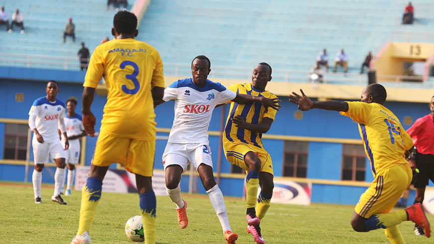 Rayon Sports midfielder Seph Niyonzima dribbles past Amagaju left- back Hussein Utaka