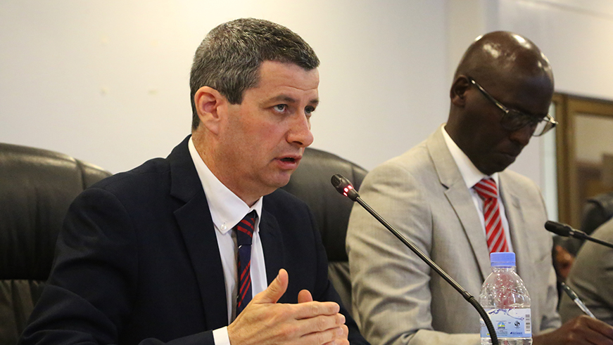 Rwanda Energy Group Chief Executive Officer Ron Weiss addresses members of the parliamentary Public Accounts Committee as Jean-Claude Kalisa, the managing director of EUCL, takes notes. / Sam Ngendahimana