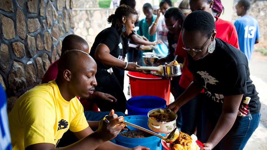Members of Solidâ€™Africa serve lunch for vulnerable patients.  