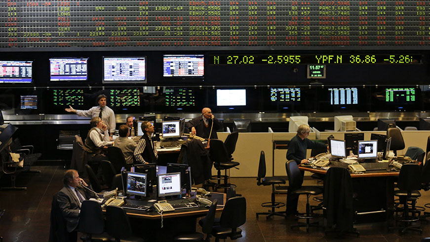 Brokers work at the Buenos Aires Stock Exchange in Buenos Aires, Argentina. Net.