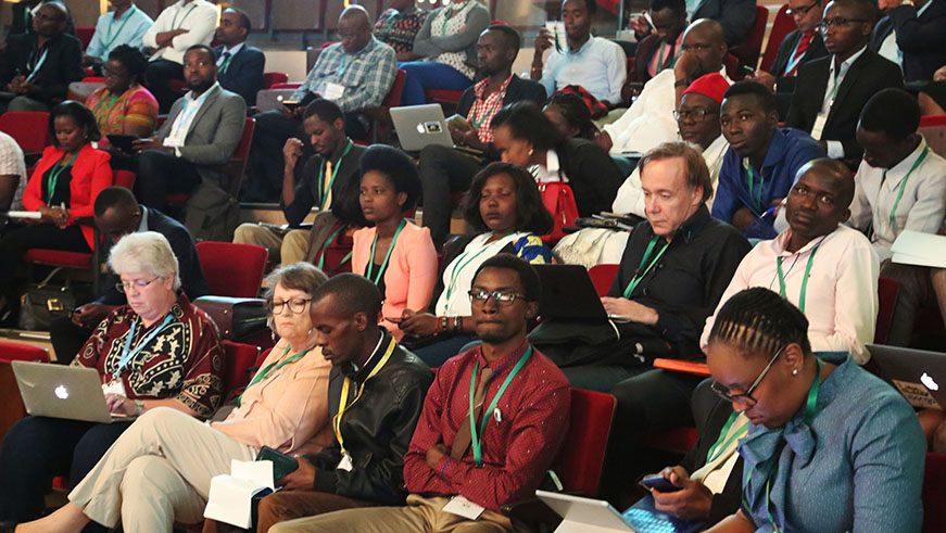 Participants follow Prime Minister Edouard Ngirenteu2019s remarks during the opening of Africa Innovation Summit in Kigali, yesterday./ Sam Ngendahimana.