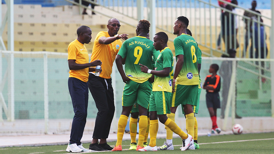 AS Kigali Head coach Eric Nshimiyimana giving instructions to his players against Rayon Sports .Sam Ngendahimana.