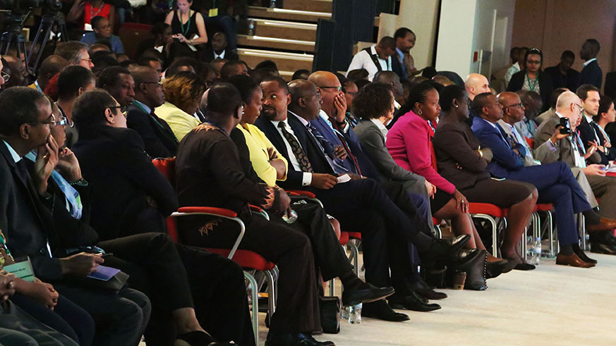 Participants follow Prime Ministerâ€™s opening remarks during the Africa Innovation Summit in Kigali yesterday. Sam Ngendahimana.