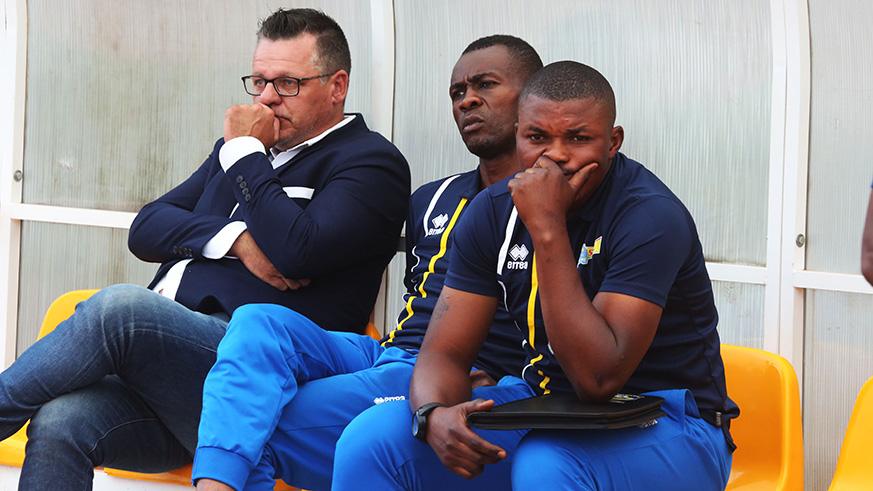 Rayon Sportsu2019 head coach Ivan Minnaert (left), Goalkeepers coach Ramazan Nkunzingoma (middle) and physical Marcel Romami (right) look so upset after losing to Amagaju. Sam Ngendahimana.