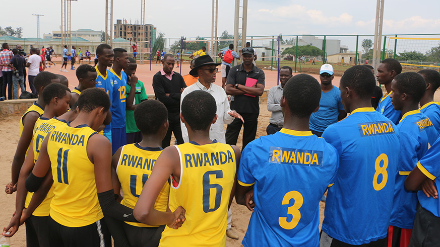 Rwanda Olympic Committee president, Amb. Valens Munyabagisha (middle), paid a courtsey visit to the youth volleyball teams (boys and girls) on Wednesday. Damas Sikubwabo.