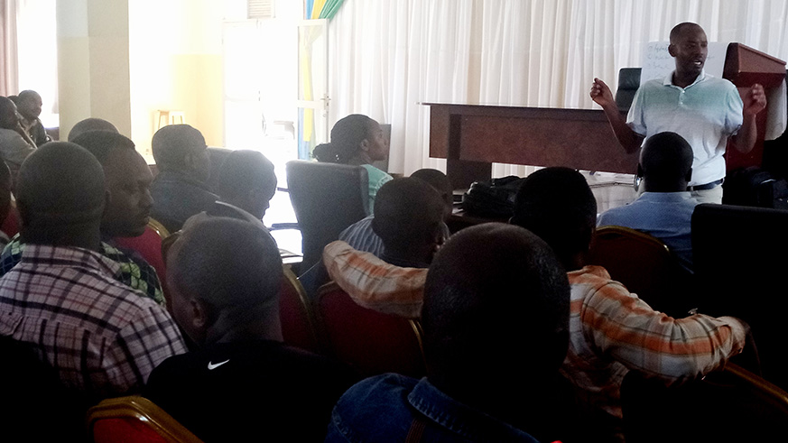RCAâ€™s Chief Cooperative Inspector in the City of Kigali, Abdul Wahab Ntaganda (in front) while training motor driver cooperative leaders from Gasabo District on Friday, June 8, 2018 (E.Ntirenganya).