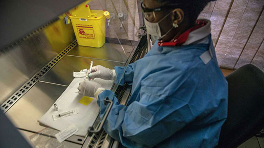 An HIVAids vaccine is tested in a laboratory in South Africa. Scientists are hoping the ongoing trial could be a game changer. net photo.