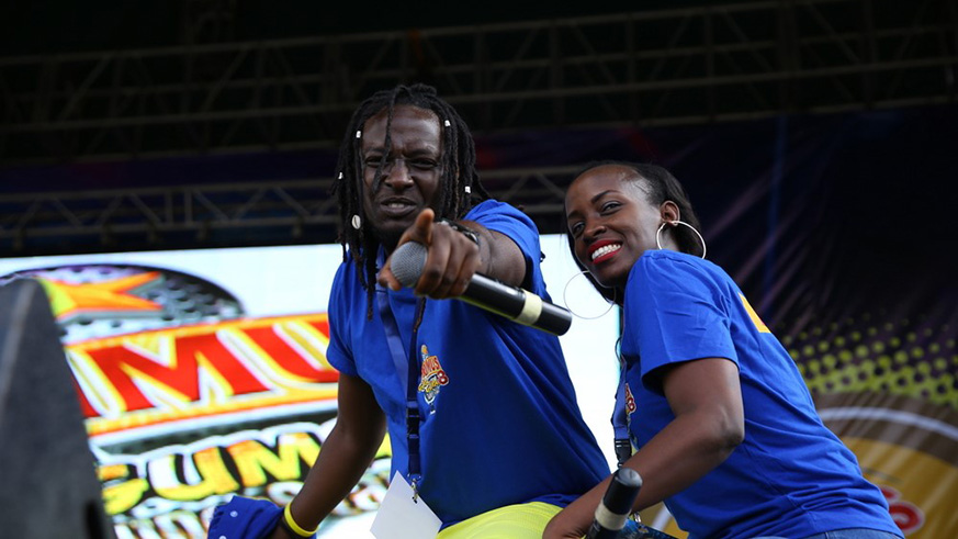 Sylvie and MC Buryohe dance for the crowd during a Primus Guma Guma road show. courtesy