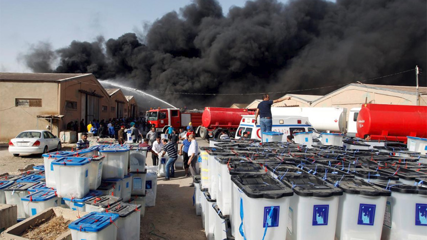 Smoke rises from a storage site in Baghdad, housing ballot boxes from Iraq's May parliamentary election. / Internet photo
