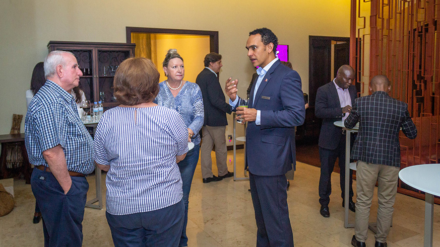 Kigali Marriott's Food and Beverage Director, Simon Hodson (right) chats with visitors.