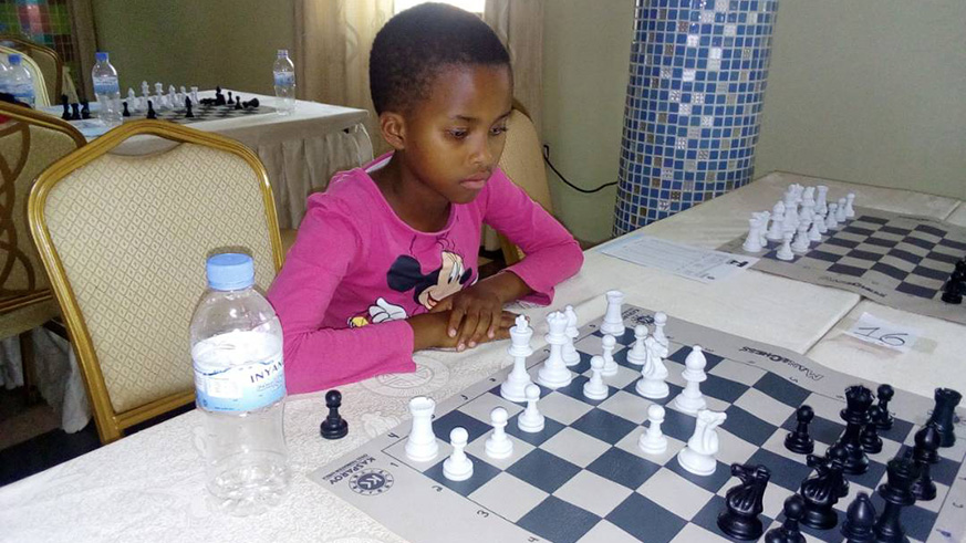 Eleven year old Happiness Mutete, a primary six pupil of Ecole Primaire Kinunga, in Gikondo, earned admiration and respect from senior chess players for her confidence and style.