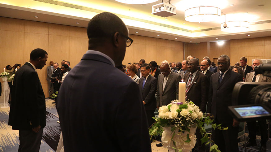 Members of diplomatics corps observe a moment of silence to honour the victims of 1994 Genocide against the Tutsi in Kigali yesterday (Sam Ngendahimana)