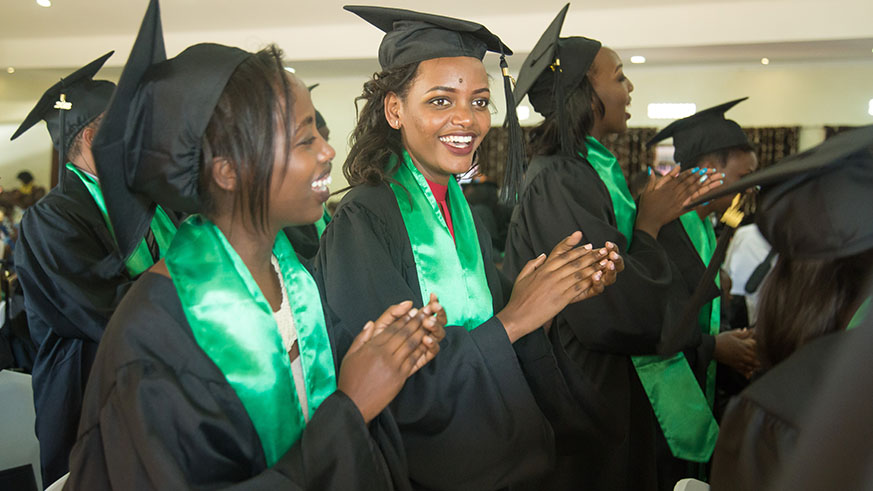 Gratuates of Kepler sing and dance joyfully on their graduation day on monday. Nadege Imbabazi