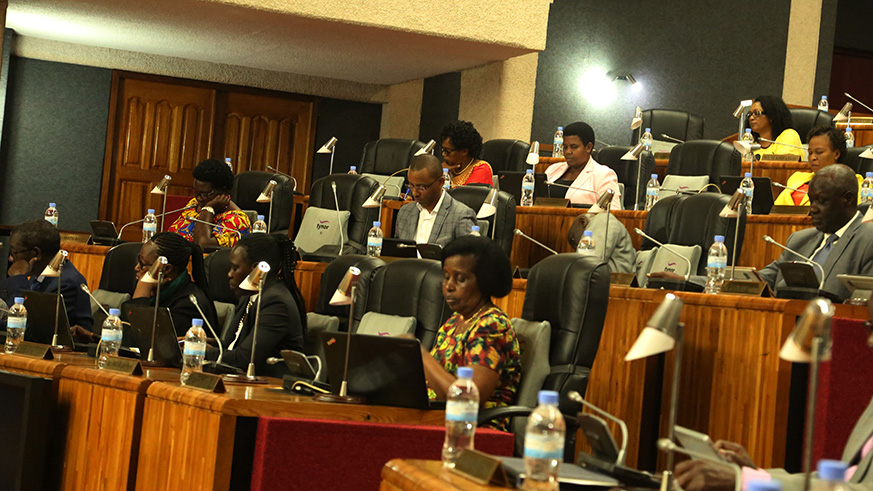 Members of the parliament follow Minister Ndagijimana u2018s presentation yesterday. Sam Ngendahi
