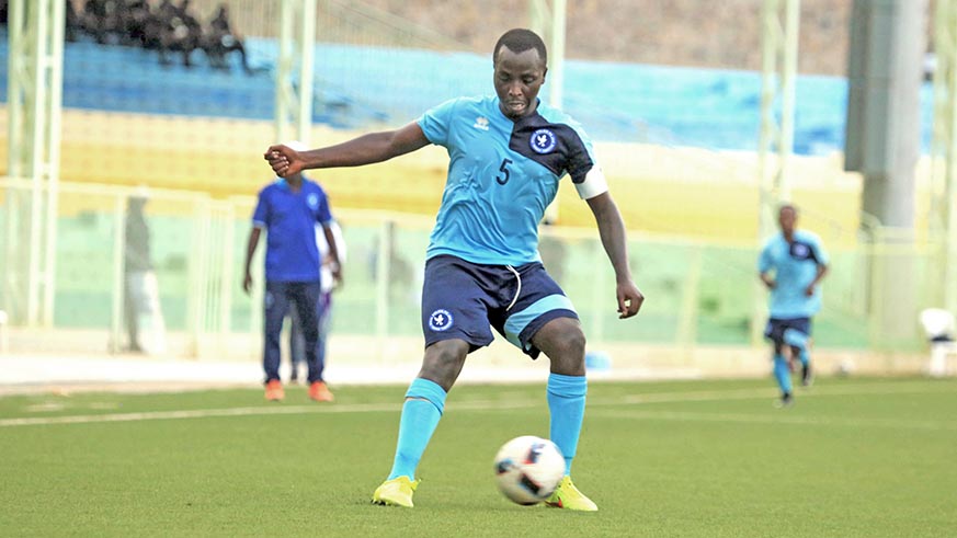 Police FC's Patrick Mwungeri with the ball during the match against Mukura (Sam Ngendahimana)