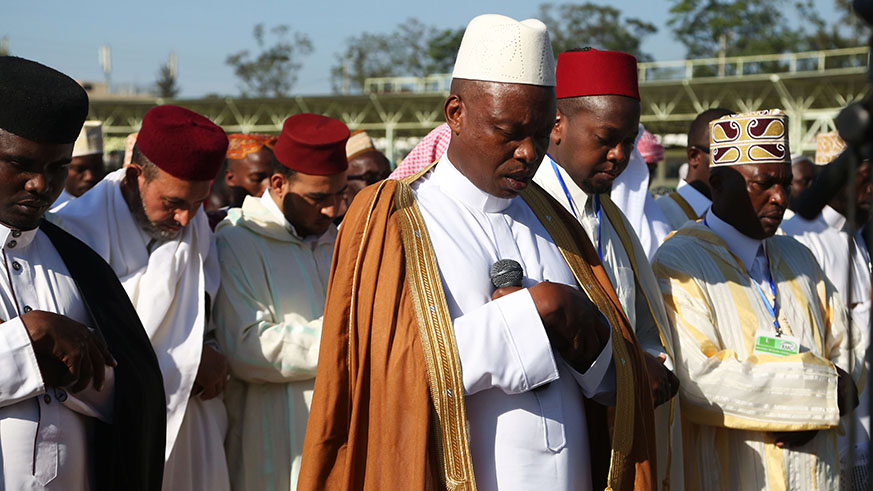 The Mufti of Rwanda, Sheikh Salim Hitimana leads Eid prayers at Kigali Regional Stadium yesterday (Sam Ngendahimana)