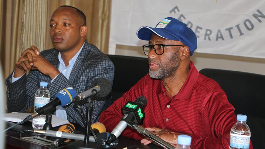 Eugene Nzabanterura (L) head of Rwandau2019s Commonwealth delegation, and Rwanda National Olympics and Sports Committee President Valens Munyabagisha, addressing the media in a past event. File.