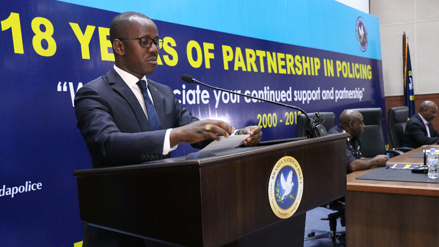 State Minister for Constitutional and Legal Affairs, Evode Uwizeyimana speaks at RNPu2019s 18-year anniversary celebrations. Courtesy.