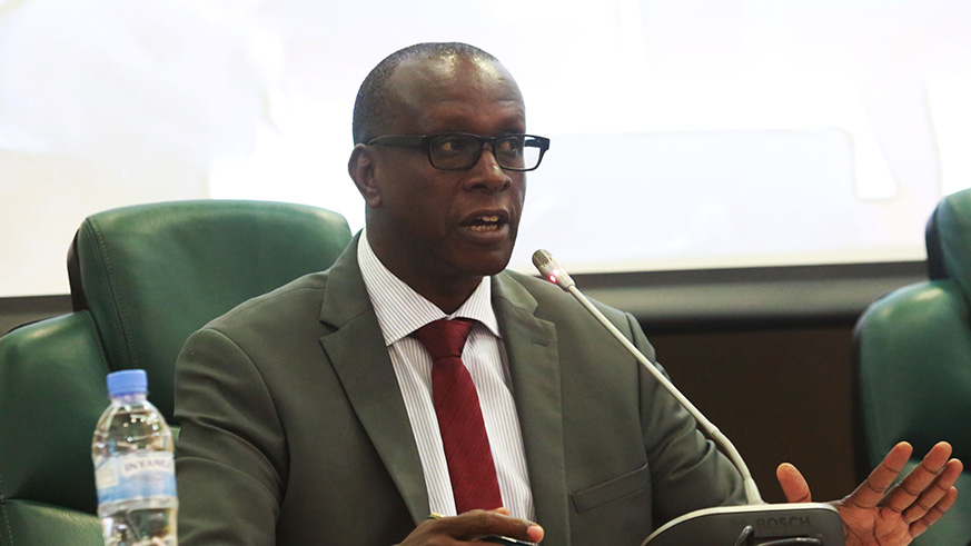 Jean-Damascu00e8ne Bizimana, the Executive-Secretary of the Commission for the Fight against Genocide. Sam Ngendahimana.