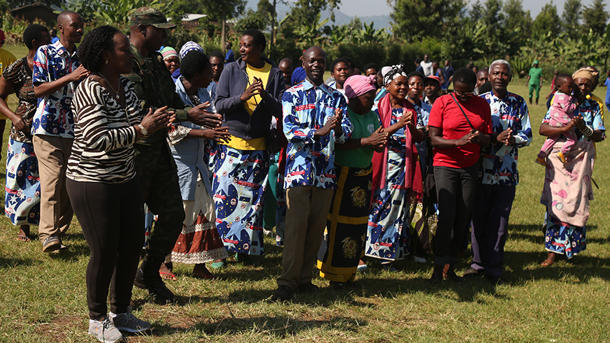 The minister of Health Dr Diane Gashumba, interacting with community health workers in Burera District.