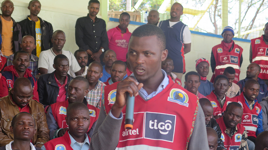 A motorcyclist asks a question during the meeting at Kigali Stadium on Sunday. Eddie Nsabimana.