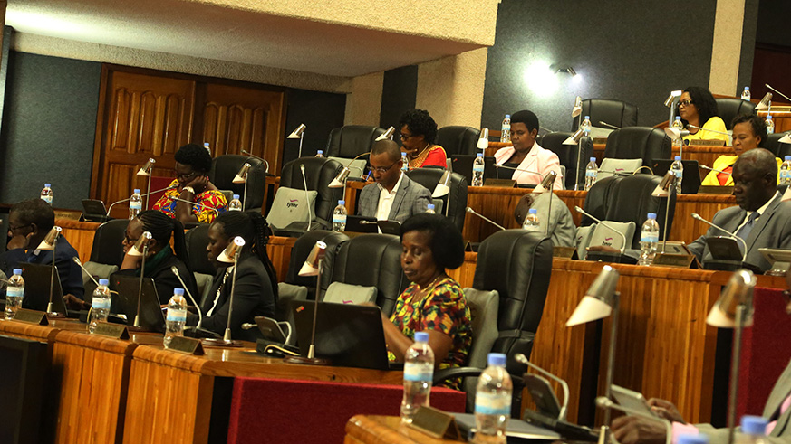 Members of the parliament follow Finance Minister Uzzielu2019s presentation during the budget reading last week. Sam Ngendahimana.