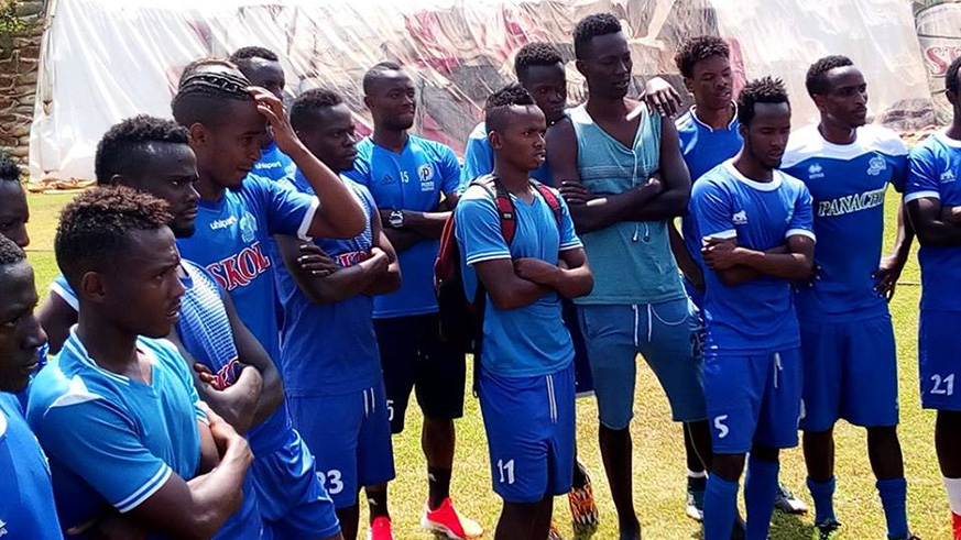 Rayon Sports players attentively listen as Roberto Oliveira GonÃ§alves do Carmo was being unveiled as new head coach on Tuesday morning. Courtesy 