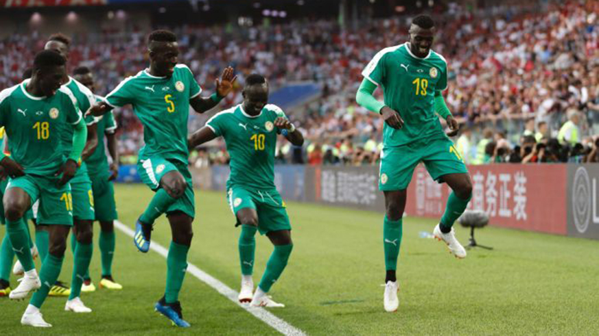 Senegal's forward Mbaye Niang (right) celebrates after scoring Senegal's second goal against Poland on Tuesday night at the Spartak Stadium in Moscow. Net photo