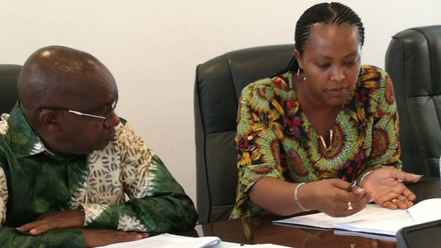 Gender and Family Promotion Minister Esperance Nyirasafari (R) before the parliamentary commission last week. Courtesy 