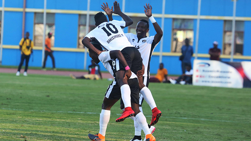 Midfielder Muhadjiri Hakizimana (on shoulders of Djihad Bizimana) and Aimable Nsabimana (right) were on target as APR beat Etincelles 2-0 yesterday at Amahoro Stadium. (Sam Ngendahimana)
