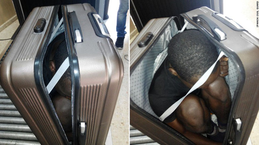 Photos taken by Spanish officials show a teen migrant hiding inside a suitcase. Net.