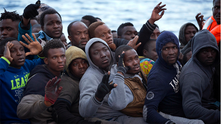 A boatload of migrants is assisted off the coast of Libya on Feb 3. Net.