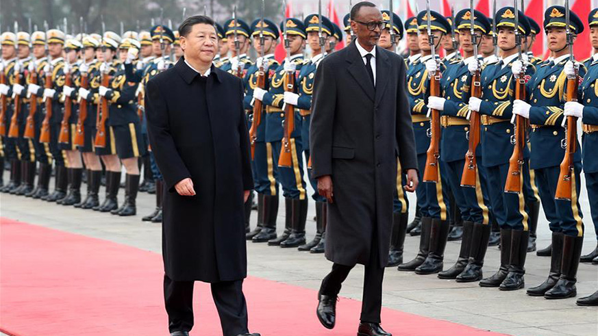 President Kagame and his Chinese counterpart Xi Jinping inspect a guard of honour during his visit to China in March 2017. (Courtesy)