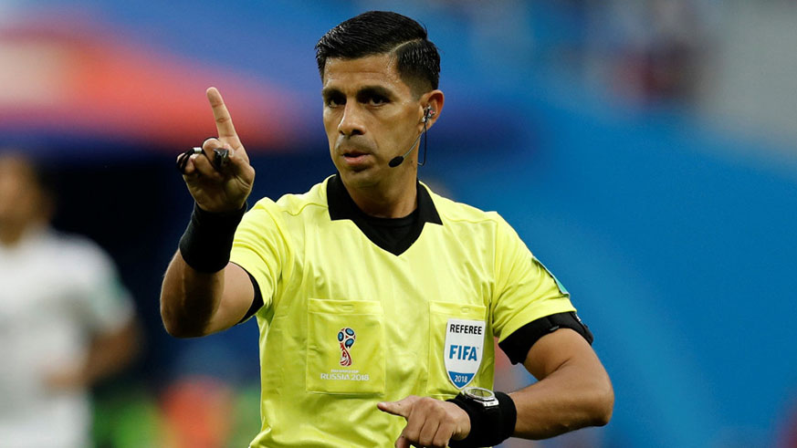 Referee Enrique Caceres. Net photo
