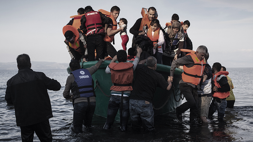 Refugees from Afghanistan and Syria arrive in boats on the shores of Lesbos near Skala Sikaminias, Greece on Nov. 10 2015. Net.