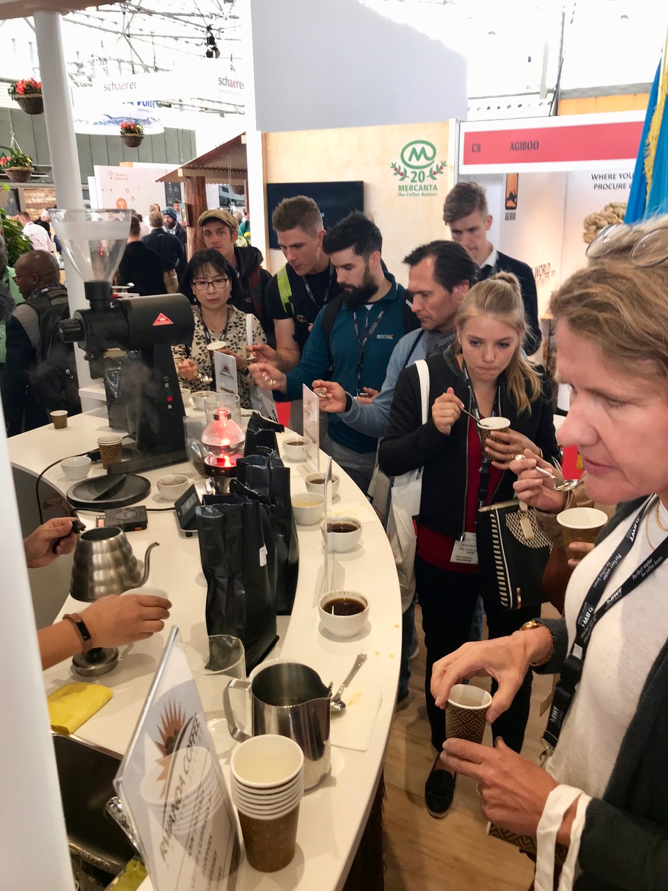 People taste Rwandaâ€™s specialty coffee at the exhibition in Amsterdam. Courtesy.