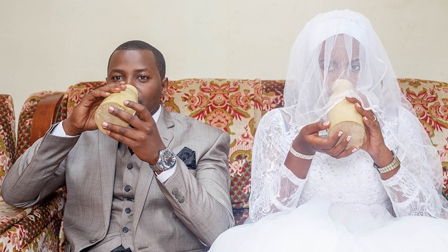 A couple drink milk during a traditional wedding ceremony. (courtesy)