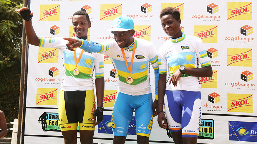 Rnus Byiza Uhiriwe (L) in juniors, Joseph Areruya (M) in elites and Jacqueline Tuyishimire (R) in womenu2019s category, celebrate after winning ITT titles of the national championship yesterday. Sam Ngendahimana.