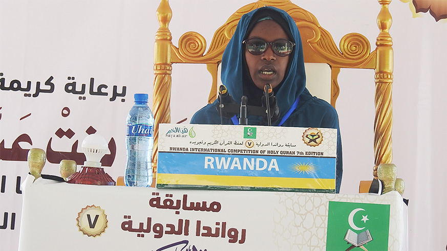A Rwandan Aisha Nikuze reciting Koran during the competition. She emerged third with 98.27.