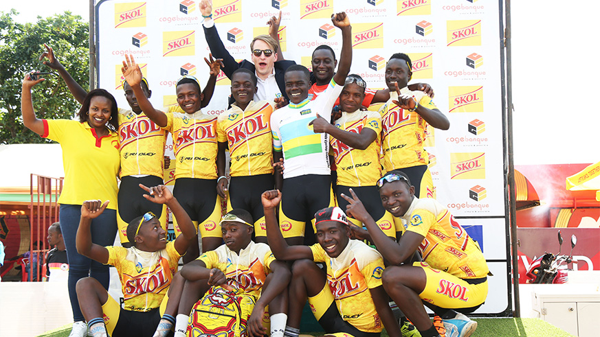 Jean Eric Habimana who won in Juniors category poses with his teammates to celebrate the victory of Fly Cycling Club's rider