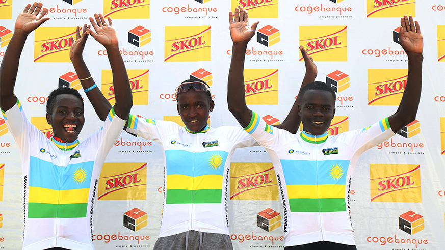 (L-R) National Championship winners Didier Munyaneza(U23 and Elites Men) Xaverine Nirere (Women) and Jean Eric Habimana (Juniors) celebrate the title in Kigali  yesterday (Sam Ngendahimana)