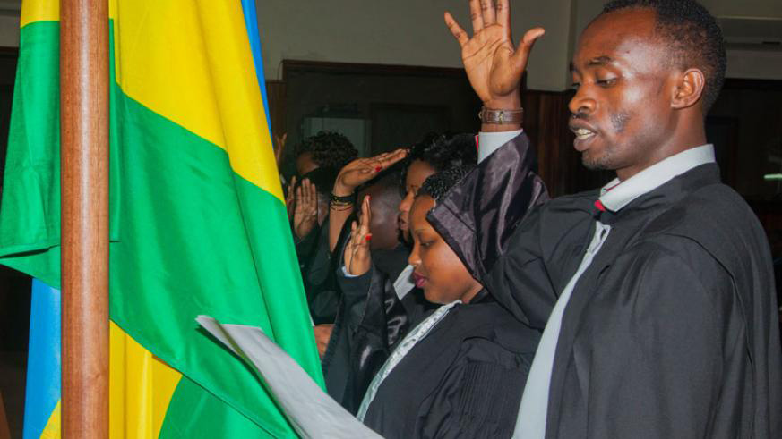 Lawyers take oath to join the bar in a past function. Practicing lawyers think the legal aid law is necessary. File.