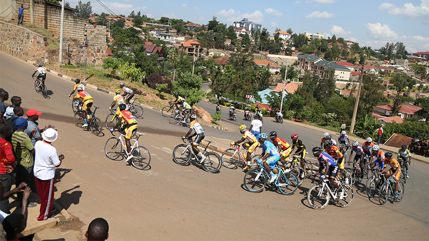 Riders captured here as they climb the most challenging corner of the race at Remera