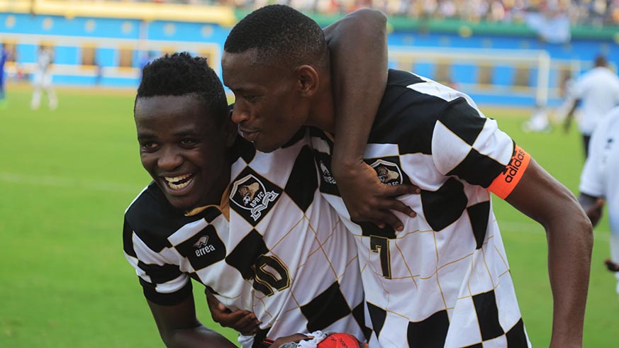APR FC skipper Jean Baptiste Mugiraneza and  Muhadjiri Hakizimana celebrate after defeating Rayons Sports 2-1. Sam Ngendahimana.